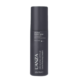 A bottle of L’ANZA Healing Style Thermal Defense Spray, used for hair protection. | Blush Salon Collective - Fargo, ND