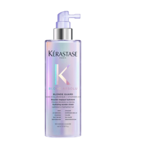 A clear pump bottle of Kérastase Paris Blond Absolu Blonde Guard hydrating solution for blonde or highlighted hair, shown against a plain white background—an essential addition to any hair care routine from the innovative Blond Absolu collection. | Blush Salon Collective - Fargo, ND