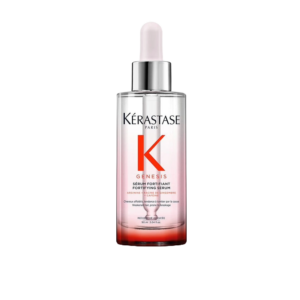 A 90ml bottle of Kérastase Genesis Fortifying Serum, a strengthening serum with a dropper cap, featuring a gradient pink design and black text on the label, shown on a plain white background. | Blush Salon Collective - Fargo, ND
