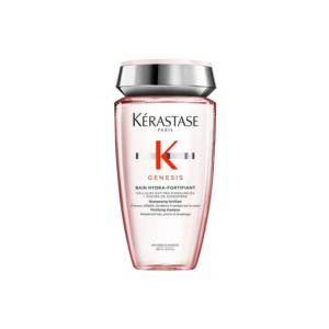 A bottle of Kérastase Genesis Bain Hydra-Fortifiant shampoo with a silver and pink cap, shown on a white background—perfect for elevating your hair care routine. | Blush Salon Collective - Fargo, ND