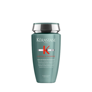 A green bottle of Kérastase Genesis Homme Bain De Masse Épaississant shampoo, featuring a sleek black and silver cap, displayed on a plain white background. | Blush Salon Collective - Fargo, ND