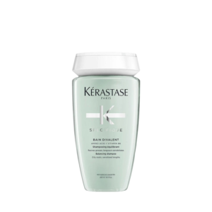 A bottle of Kérastase Specifique Bain Divalent, an expert oily scalp shampoo for oily roots and sensitized lengths, enriched with amino acid and vitamin B6, in a 250 ml size. | Blush Salon Collective - Fargo, ND