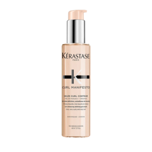 A bottle of Kérastase Curl Manifesto Gelee Curl Contour leave-in cream with a pump dispenser, designed for curly, very curly, and coily hair. | Blush Salon Collective - Fargo, ND