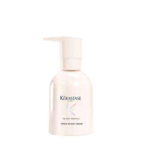 A bottle of Kérastase Paris Gloss Absolu Frizz-Glaze Creme with a pump dispenser, shown against a plain white background, perfect for delivering anti-frizz protection and radiant shine. | Blush Salon Collective - Fargo, ND