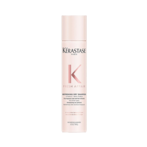 A bottle of Kérastase Paris Fresh Affair Refreshing Dry Shampoo with a light pink label stands upright against a plain white background, perfect for quick styling and instant freshness. | Blush Salon Collective - Fargo, ND