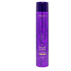 A vibrant purple can of Kérastase Laque Couture styling spray stands upright on a plain background, perfect for flawless hair styling. | Blush Salon Collective - Fargo, ND