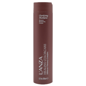 A brown bottle of L’ANZA Healing ColorCare Clarifying Shampoo, 10.1 fl. oz., features white text and a convenient flip-top cap—perfect for maintaining vibrant color while enjoying a deep, clarifying shampoo cleanse. | Blush Salon Collective - Fargo, ND