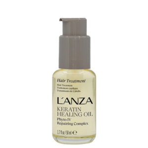 A 50 ml bottle of L’ANZA Keratin Healing Oil Hair Treatment with a grey pump cap, labeled as a repairing complex. This luxurious Healing Oil is designed to deeply nourish and revitalize your hair, leaving it healthy, smooth, and brilliantly shiny. | Blush Salon Collective - Fargo, ND