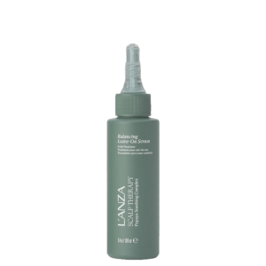 A green bottle of L’ANZA Healing Haircare Scalp Therapy Leave-On Serum, a scalp balancing leave-on serum with a pointed applicator cap, 3.4 fl oz size, shown on a plain white background. | Blush Salon Collective - Fargo, ND