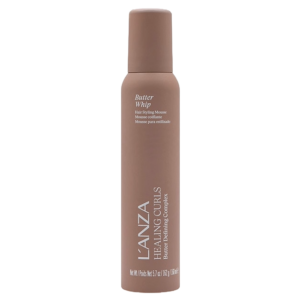 A brown bottle of L’ANZA Curl Butter Whip, a 5.7 oz leave-in styling mousse, is shown upright against a white background. | Blush Salon Collective - Fargo, ND