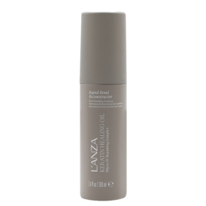 A grey bottle of Lanza Keratin Healing Oil Rapid Bond Reconstructor, 3.4 fl oz (100 ml), standing upright against a white background, formulated for Rapid Bond Reconstruction to help restore and strengthen hair with each use. | Blush Salon Collective - Fargo, ND