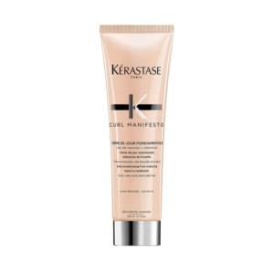A tube of Kérastase Curl Manifesto Crème De Jour Fondamentale leave-in hair cream, 150 ml, is shown against a plain white background. | Blush Salon Collective - Fargo, ND