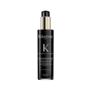 A black bottle of Kérastase Chronologiste Thermique Regenerant hair serum with a gold-black pump and white text on the label, set against a plain white background. | Blush Salon Collective - Fargo, ND